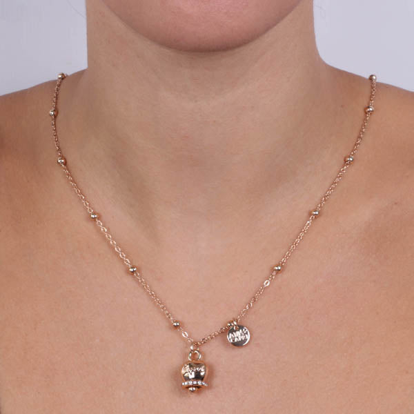 Metal necklace with pendant lucky bell embellished with white crystals and Capri writing in relief