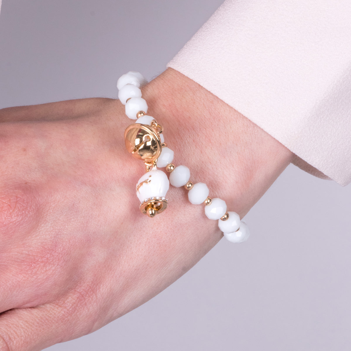 Bracciale in Metallo campanella bianca e piccolo sonaglio con pietre bianche