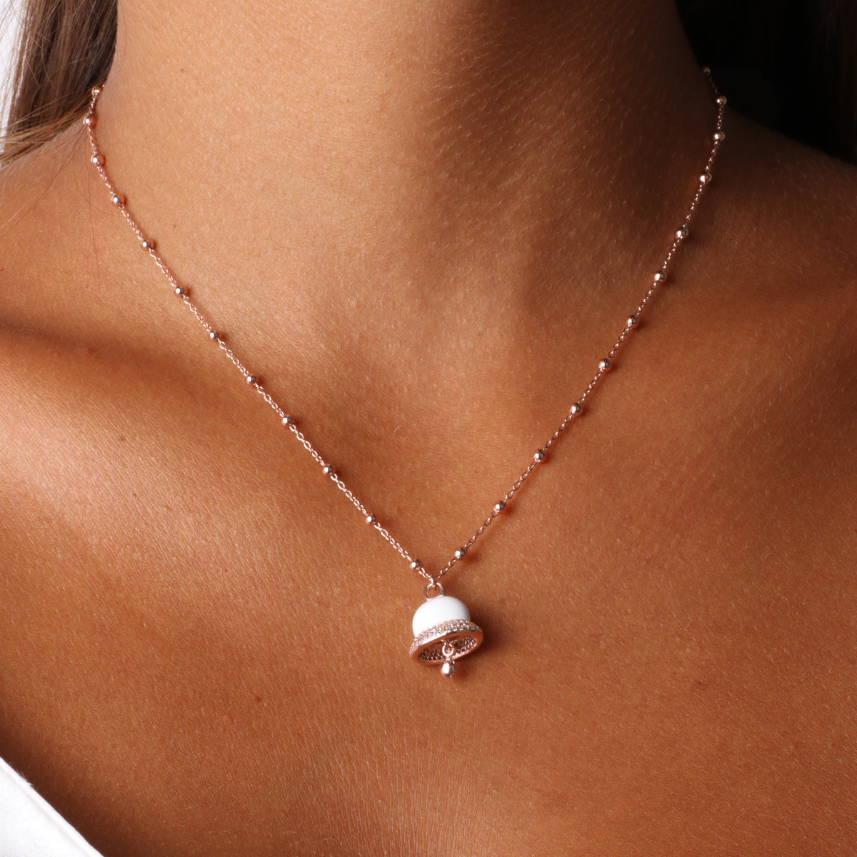925 silver necklace with turquoise enamel bell, embellished with zirconi