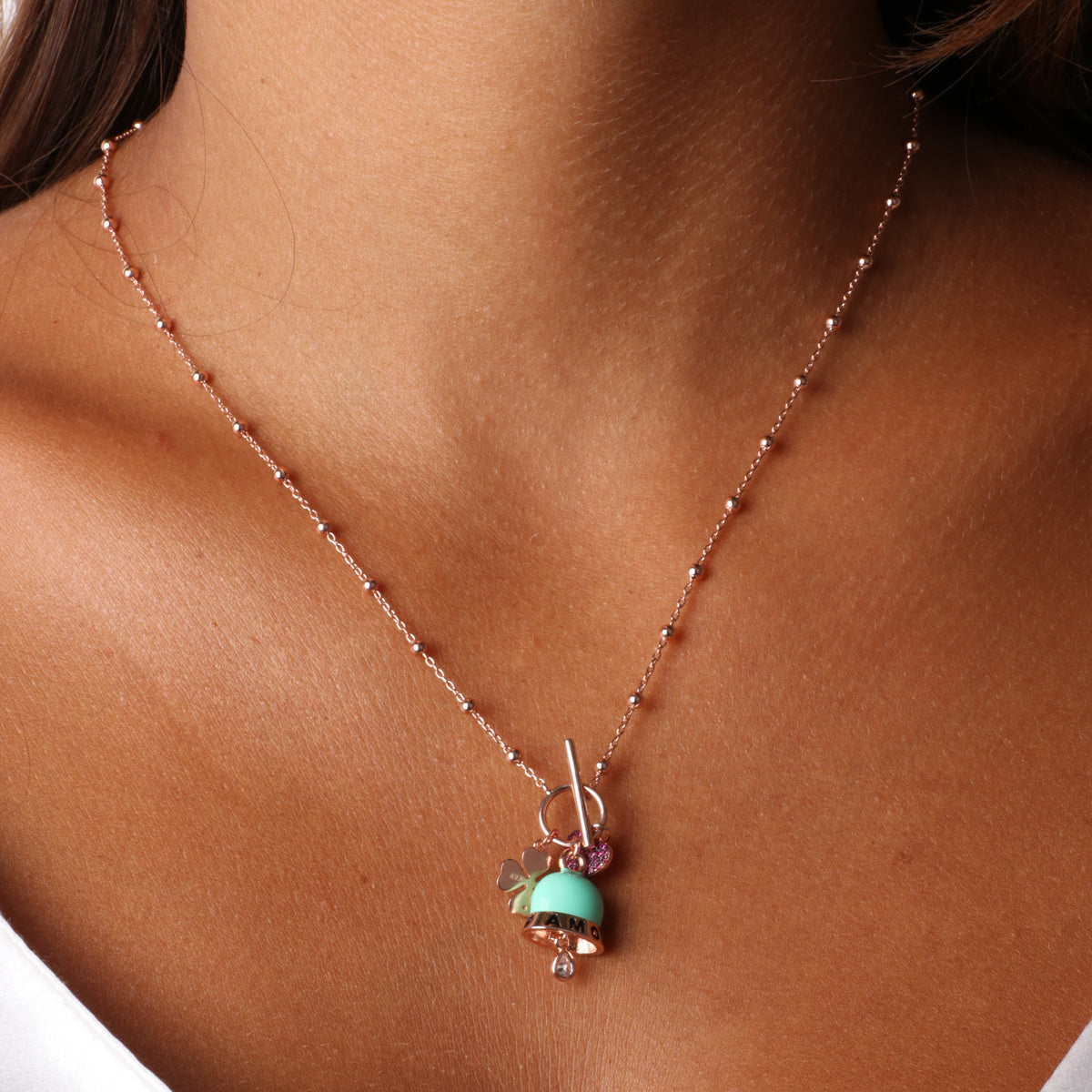 925 silver necklace with heart pendants, pink bell and four -leaf clover