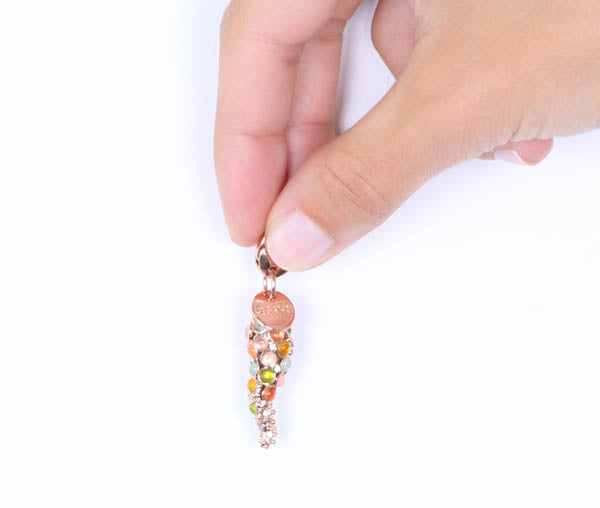 Corno metal pendant with multicolored crystals
