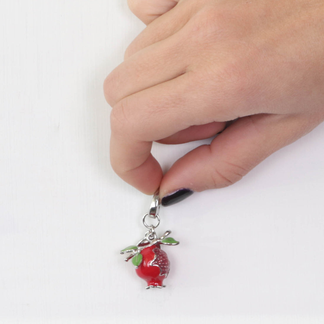 Pomegranate metal pendant with colored glazes