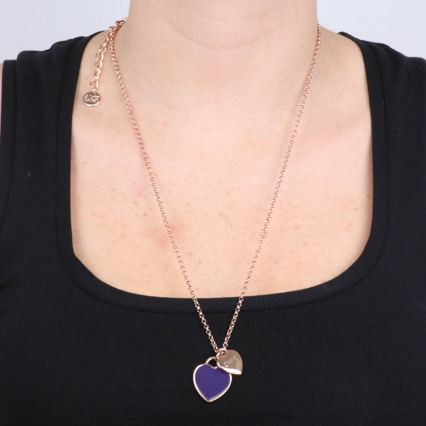 Metal necklace with heart pendant in purple enamel