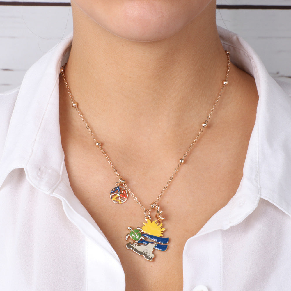 Metal necklace with sun peeks, turtle and Sicily, embellished with colored enamels and Trinacria pendant