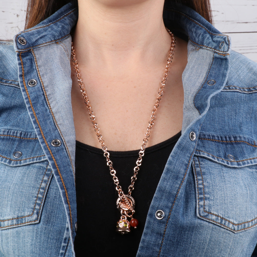 Metal necklace with colored bell and red bead