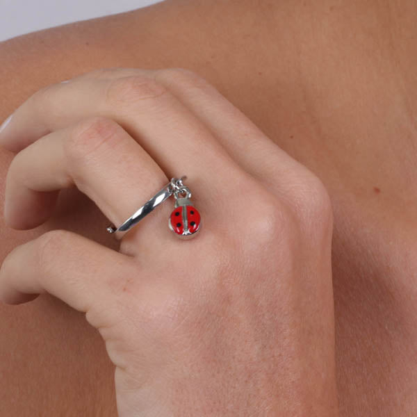 Metal ring with red enamel ladybug