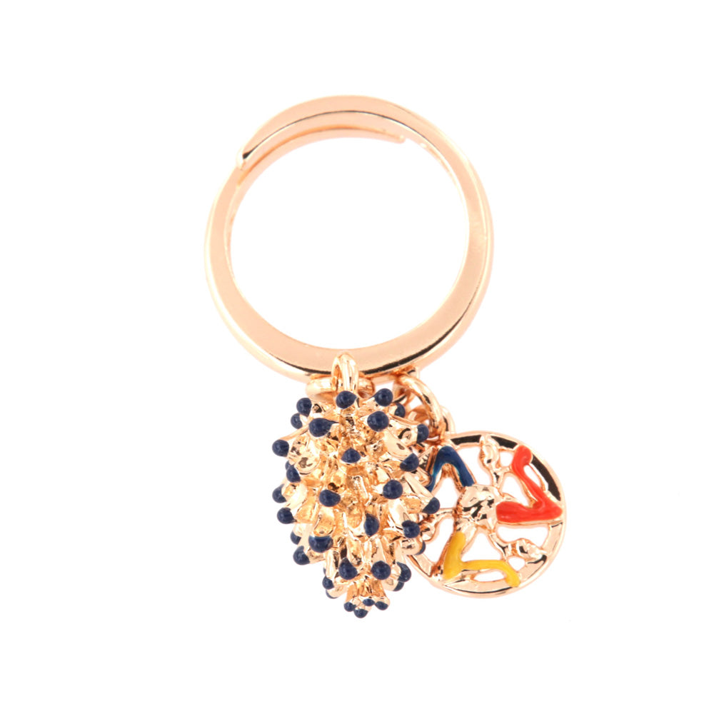 Metal ring with Siciliana charming pine cone, embellished with blue enamel tips