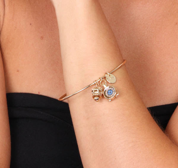 Rigid metal bracelet, with pendant drum and capri watch print