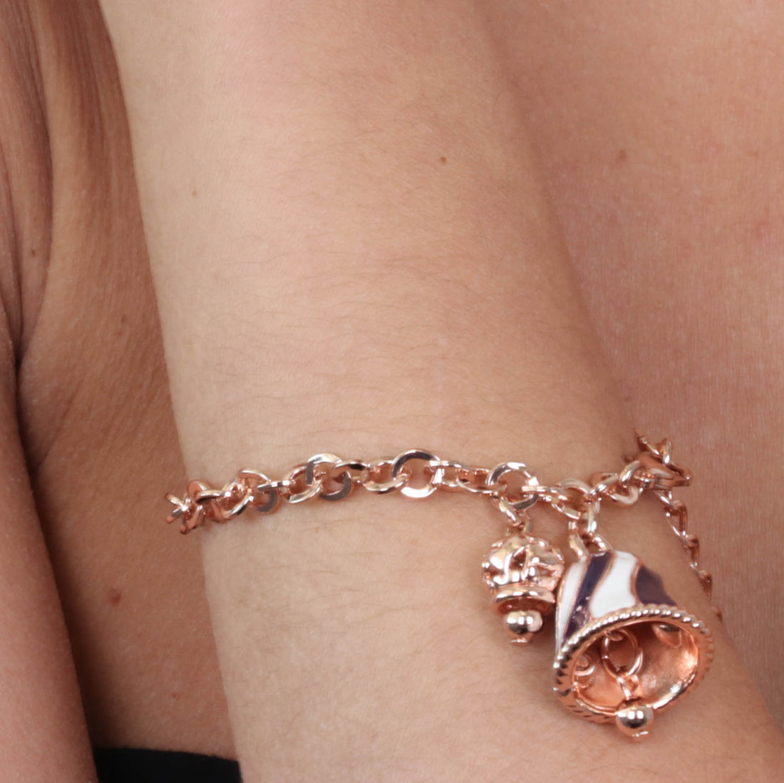 Metal bracelet with two -tone bell and bell with hearts