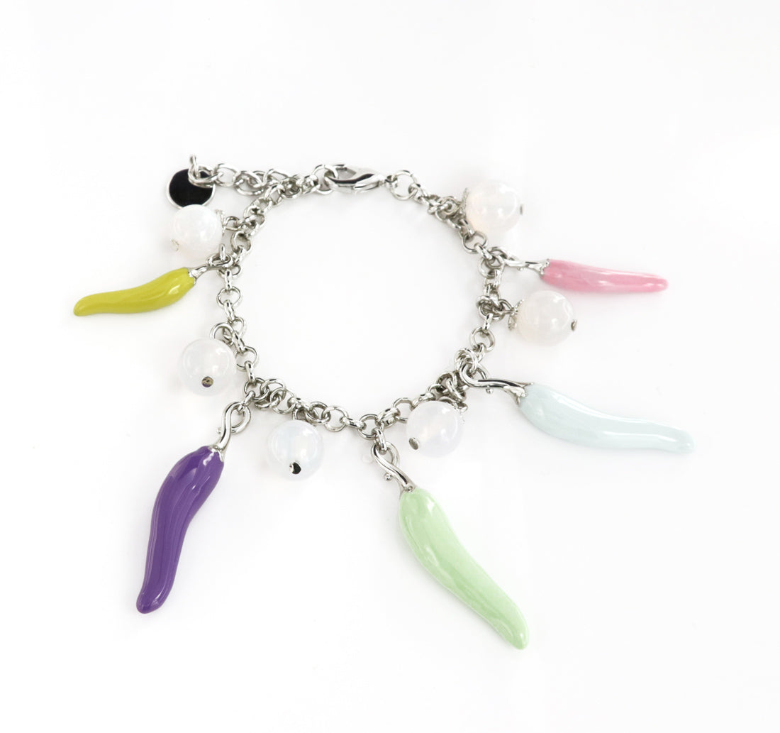 Metal bracelet with pendant luck charm cornies, embellished with colored glazes