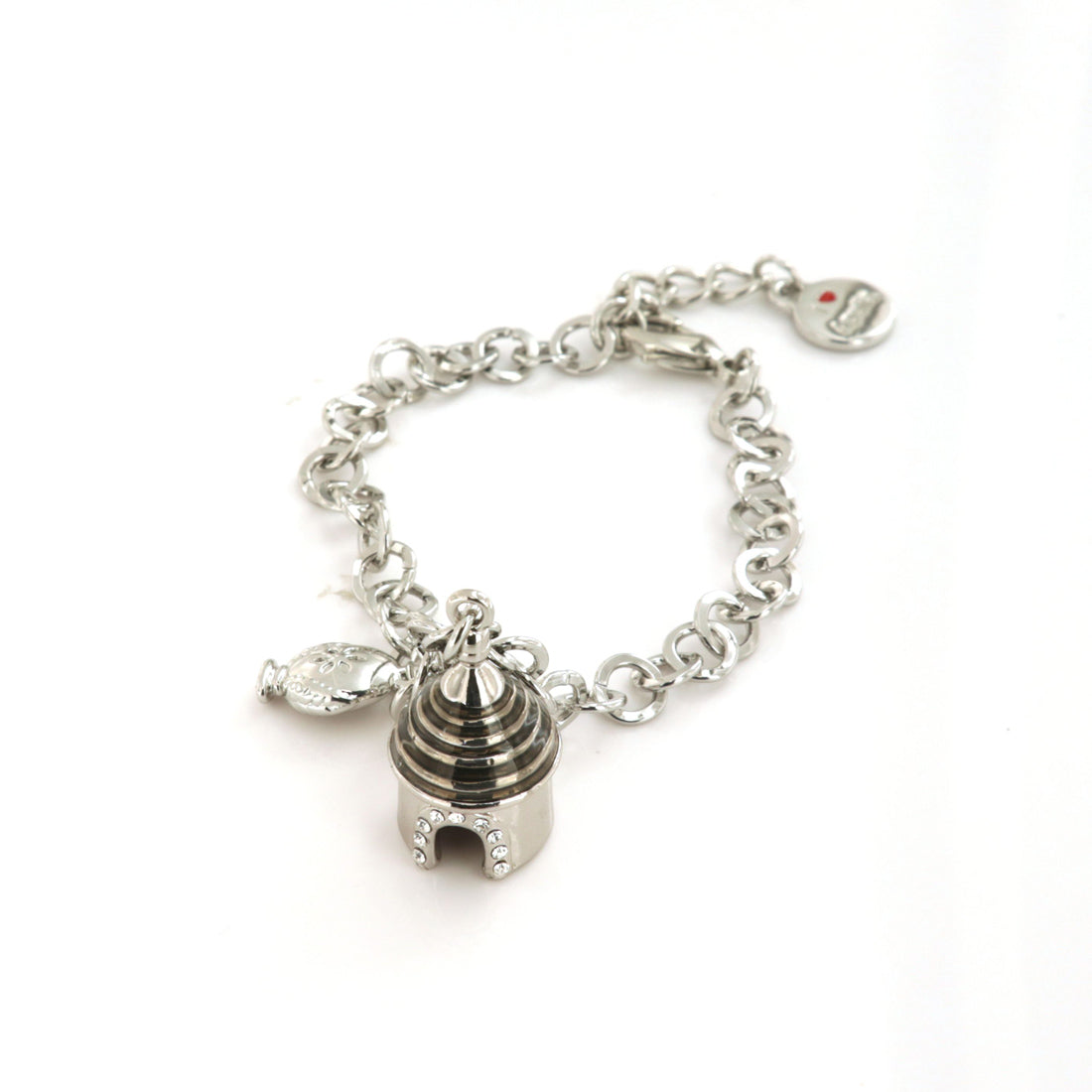Metal bracelet with pendant Apulian trullo, embellished with colored glazes and small pump on the side