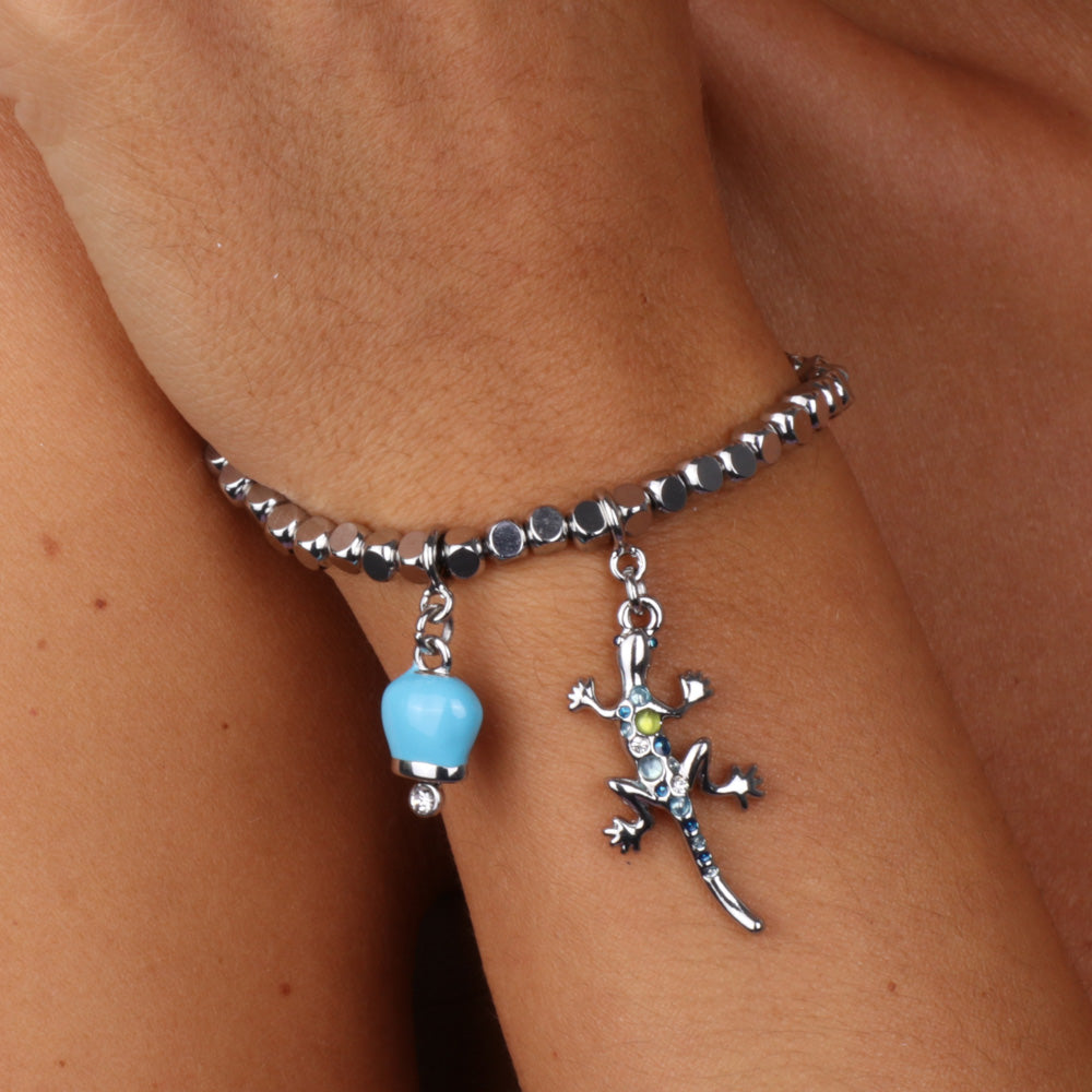 Metal bracelet with gecko pendant embellished with multicolored crystals and skewer bells in turquoise enamel