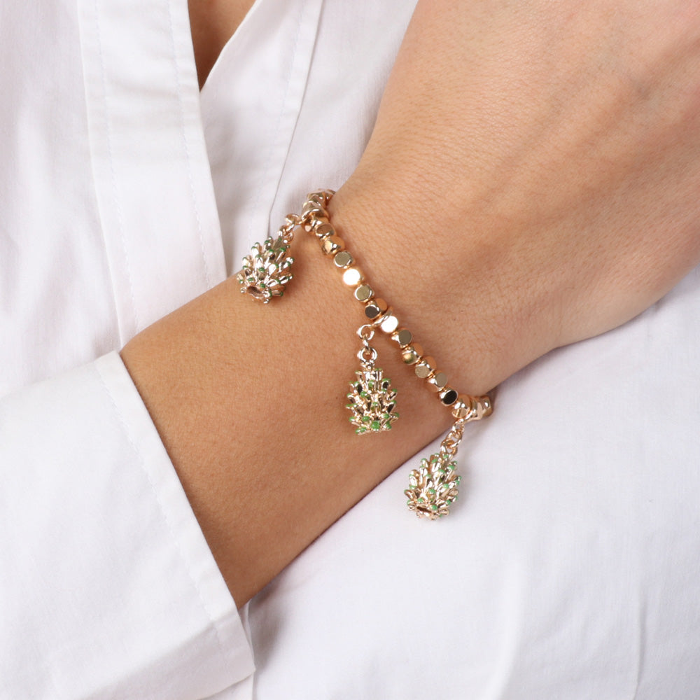 Metal bracelet with diced jersey, with trio of pendant Sicilian pine cones, embellished with green enamel tips