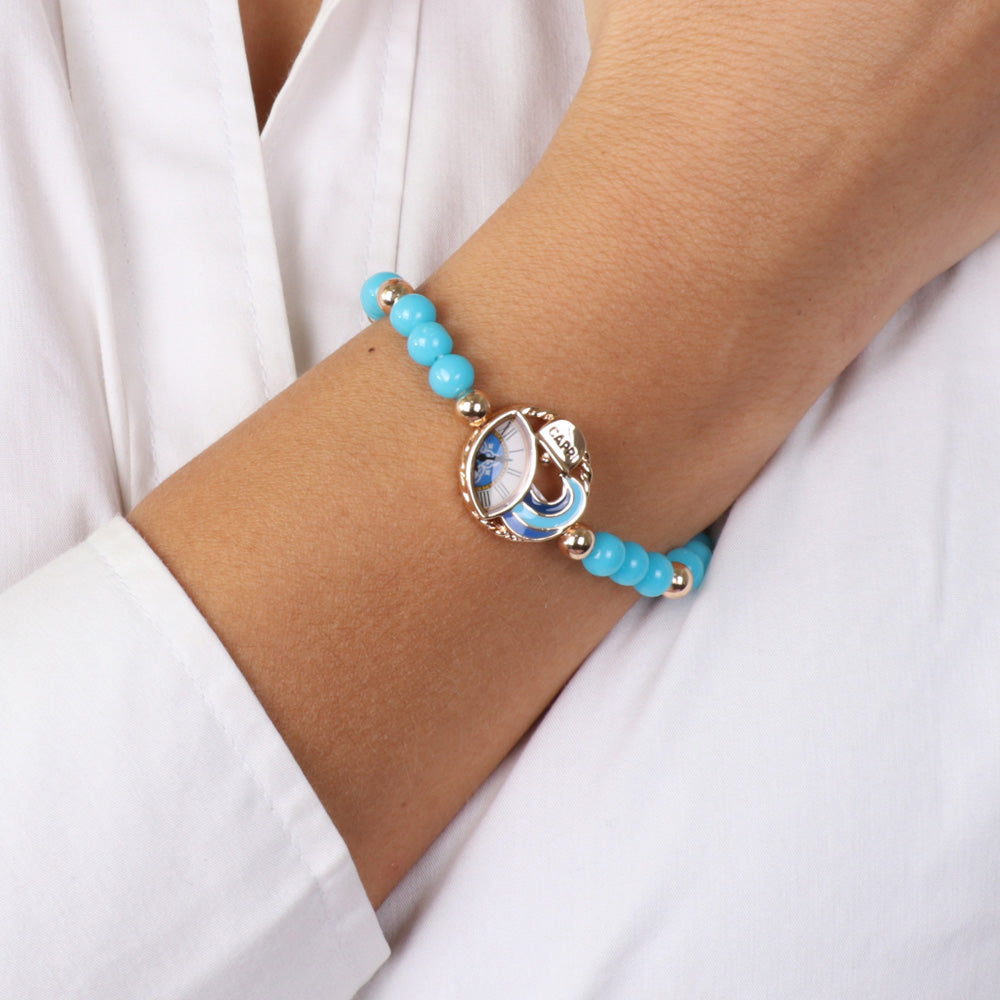 Metal bracelet with turquasins and central Capri clock embellished with colored glazes