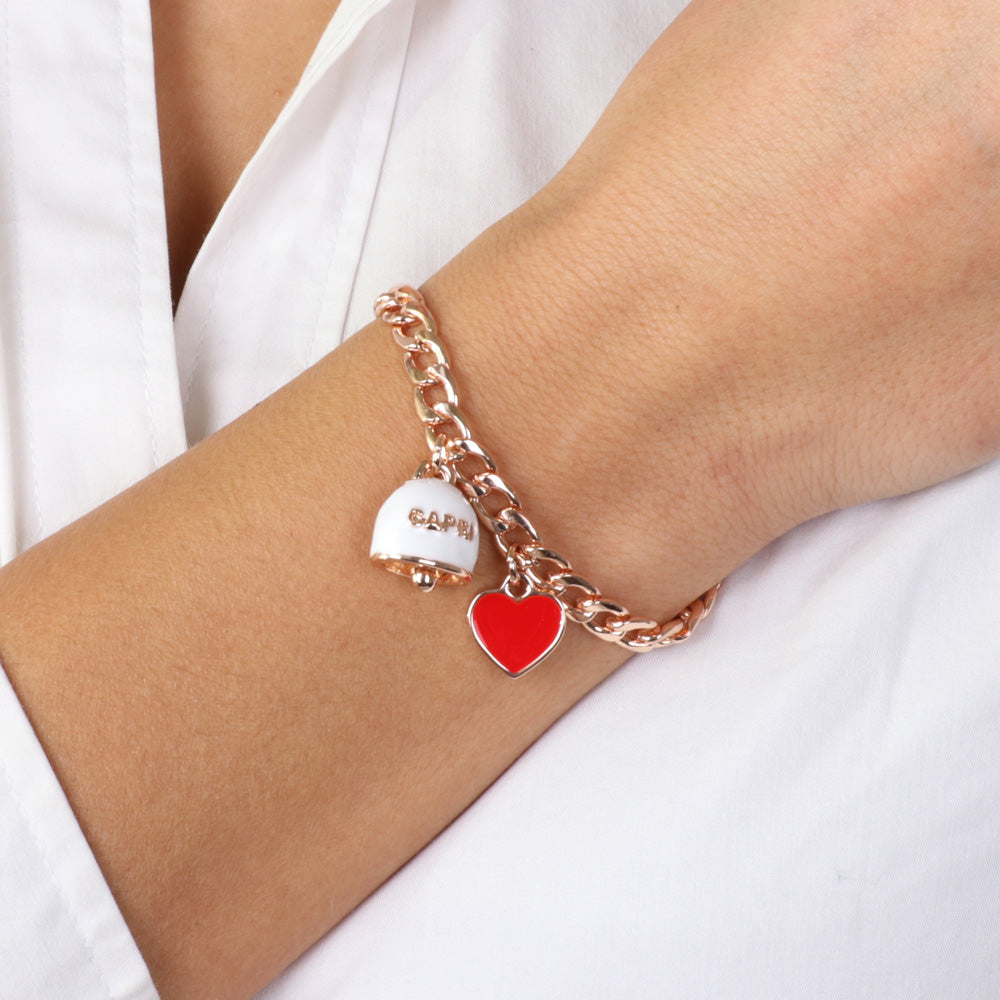Metal bracelet shirt grumeta crushed, with bell embellished with white nail polish and pendant red heart.