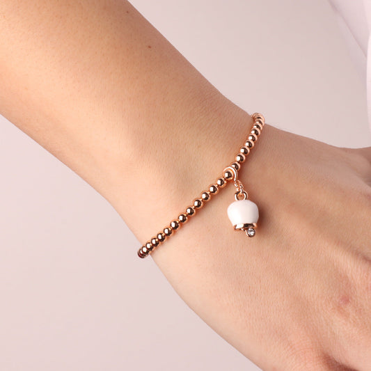 Metal bracelet ball jersey with bell bouncing white pendant embellished with crystals