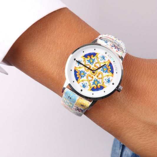 Analog metal watch with a dial embellished with maiolica caprese drawing, colored majolica shirt
