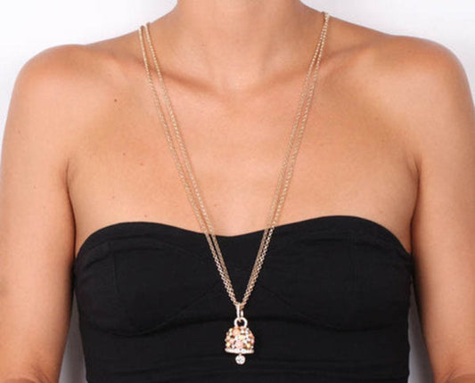 Multi-strand metal chain necklace with large colored bell pendant