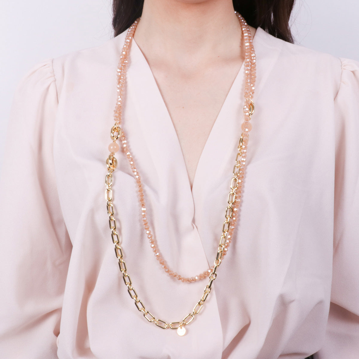 Collana in Metallo multifilo con pietre rosa cipria