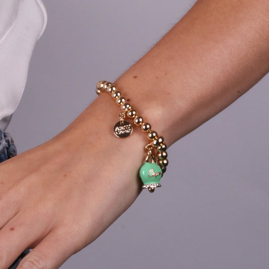 Metal bracelet with green bell written Capri