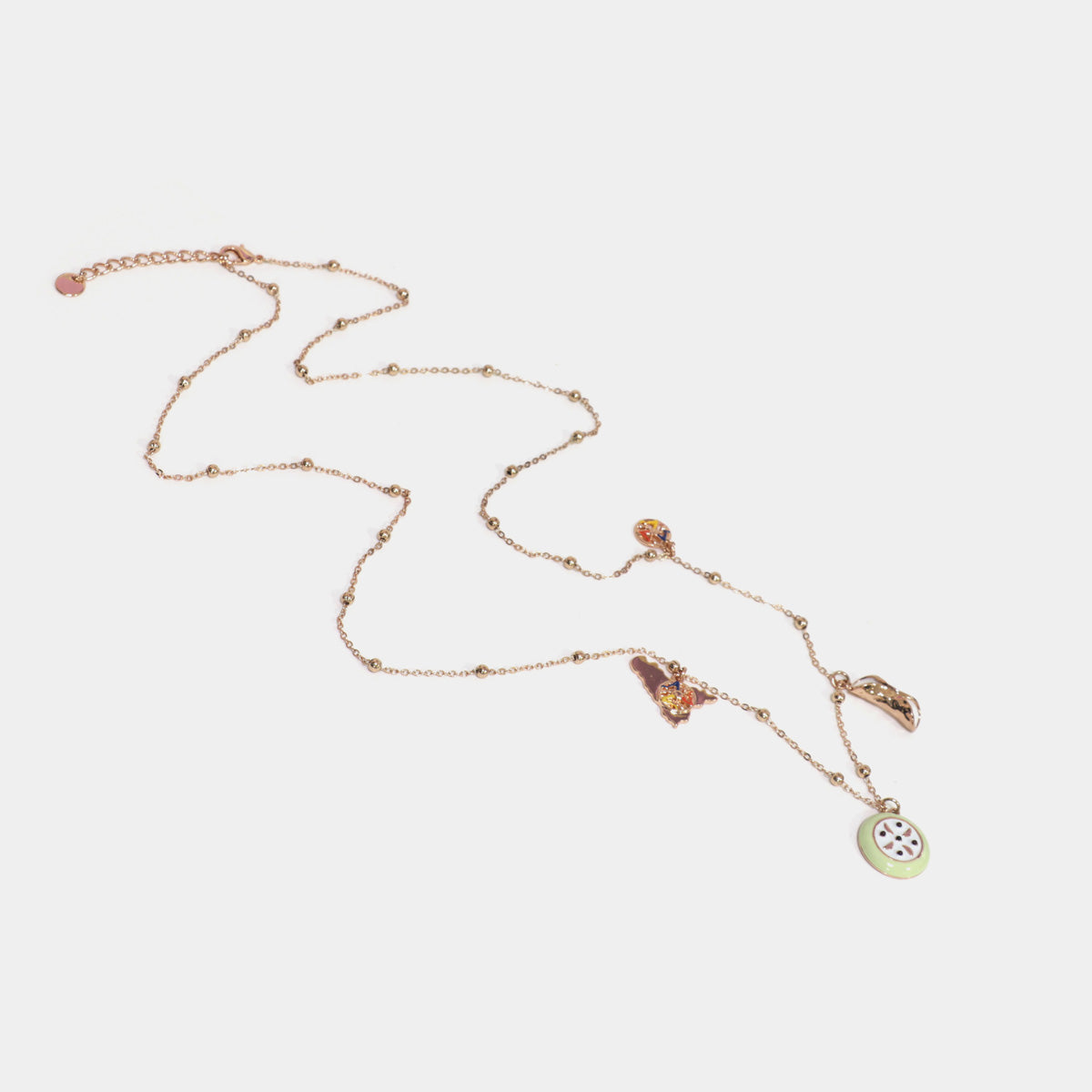 Collana in Metallo multiciondolo, con charms cannolo, cassata e Sicilia pendenti, impreziositi da smalti colorati