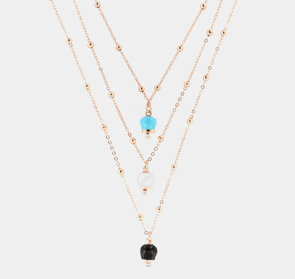 Collana in Metallo a tre fili con campanella nera, bianca e turchese