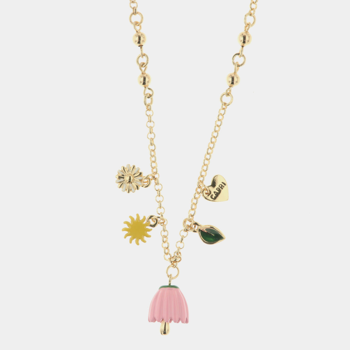 Collana in Metallo con campanella a forma di fiore rosa, sole e cuore con capri