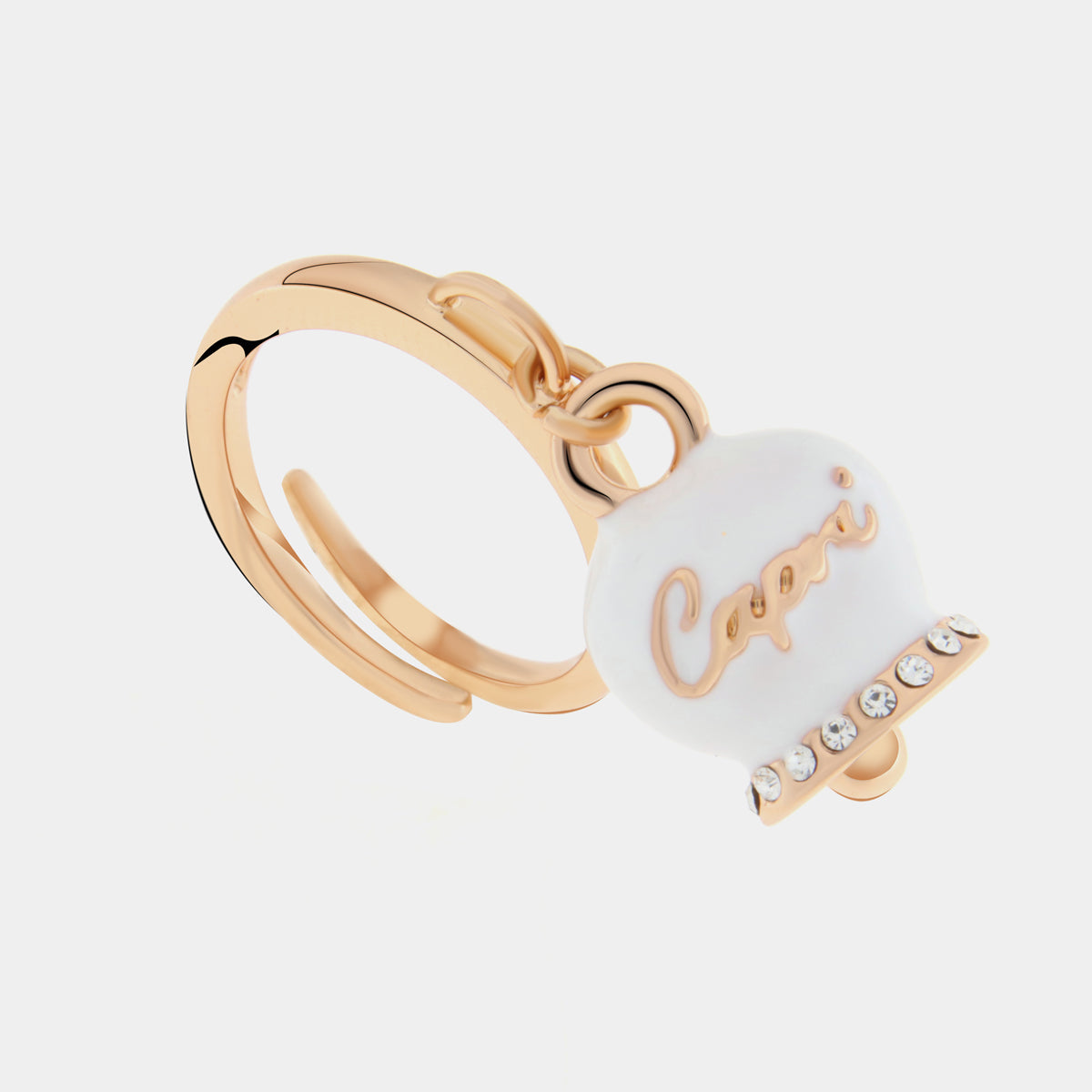 Metal ring with pendant lucky bell embellished with white enamel and crystals