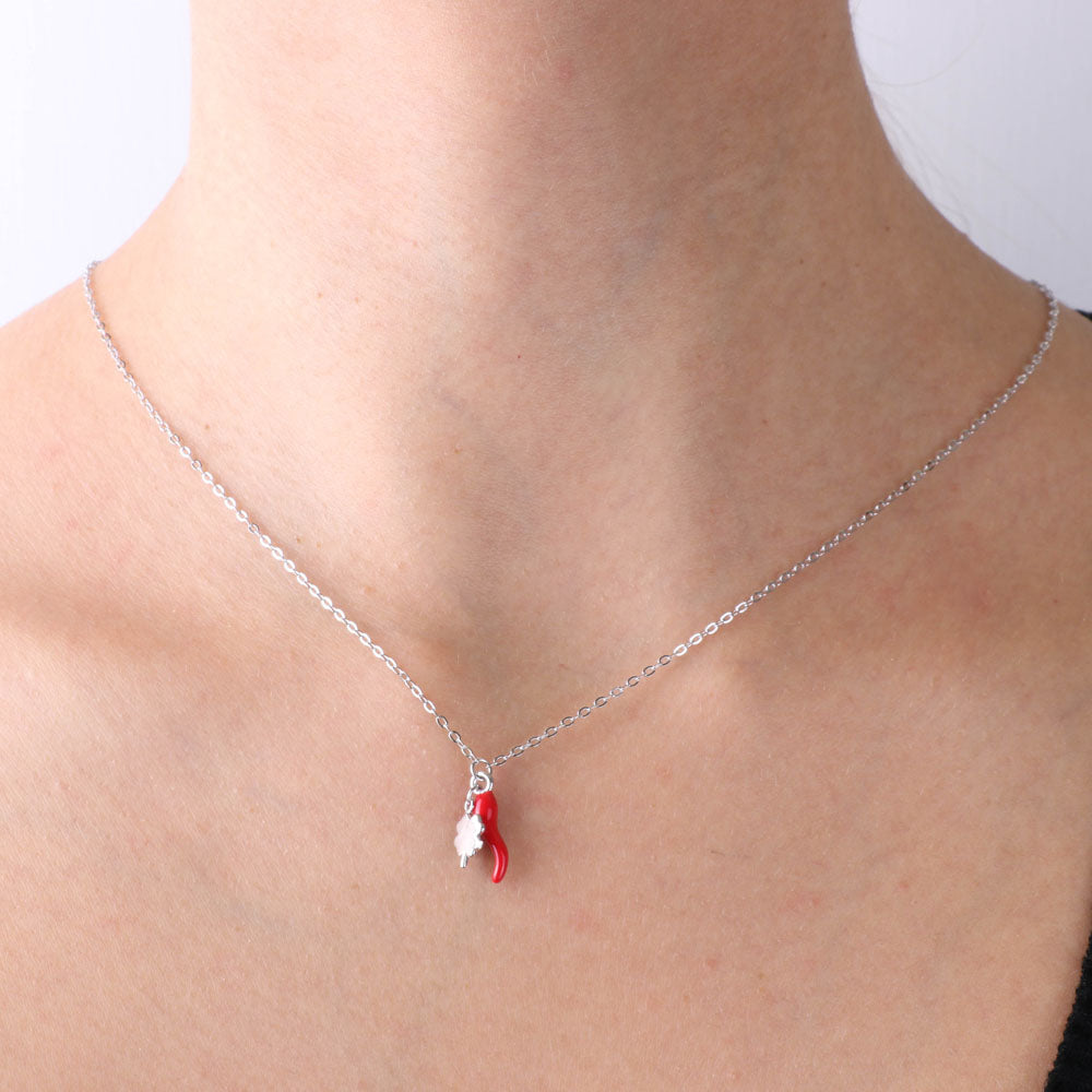 925 silver necklace with horn embellished with red enamel and four -leaf clover