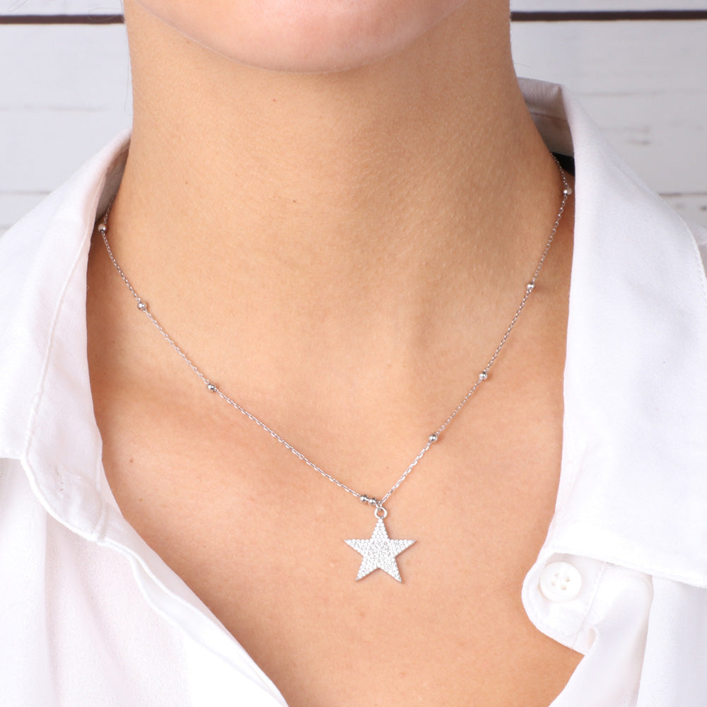 925 silver necklace with star embellished with bright white zirconi