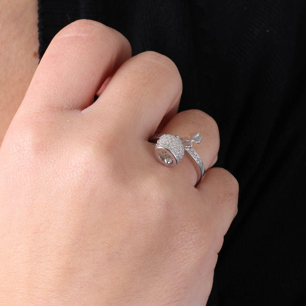 925 silver ring with charming bell and four -leaf clover embellished with cubic zirconi