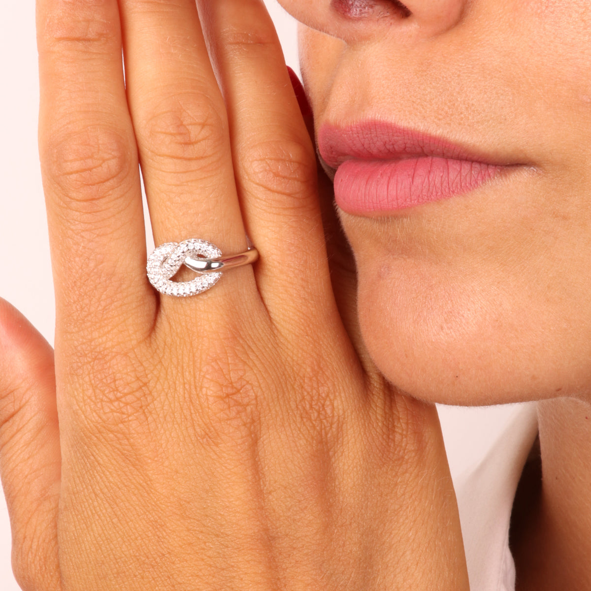 925 silver ring with knot embellished with white zirconi