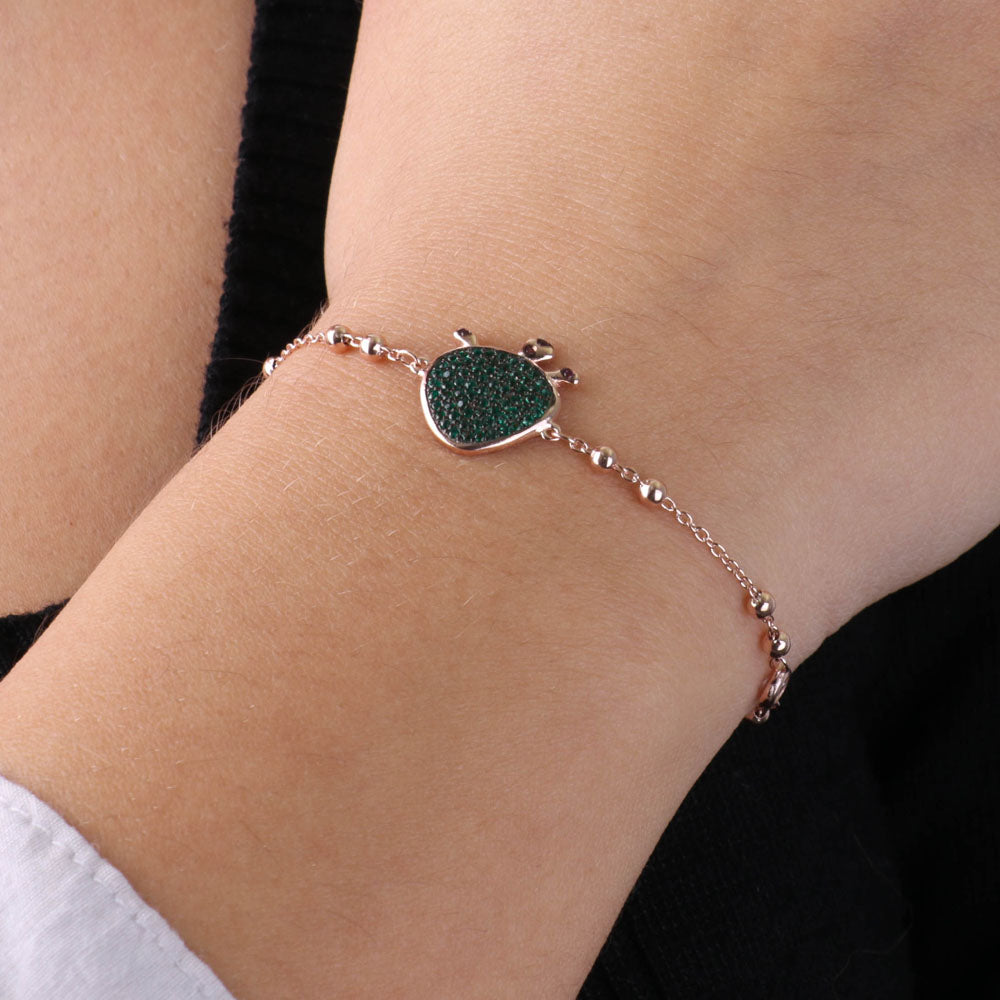 925 silver bracelet with prickly pendant of India, embellished with pavè of emerald zirconi, on a brown basis