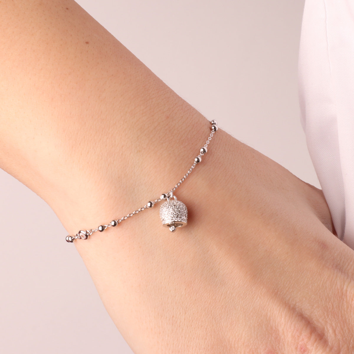925 silver bracelet in white crystals and charming bell pendant stormed by white zirconi