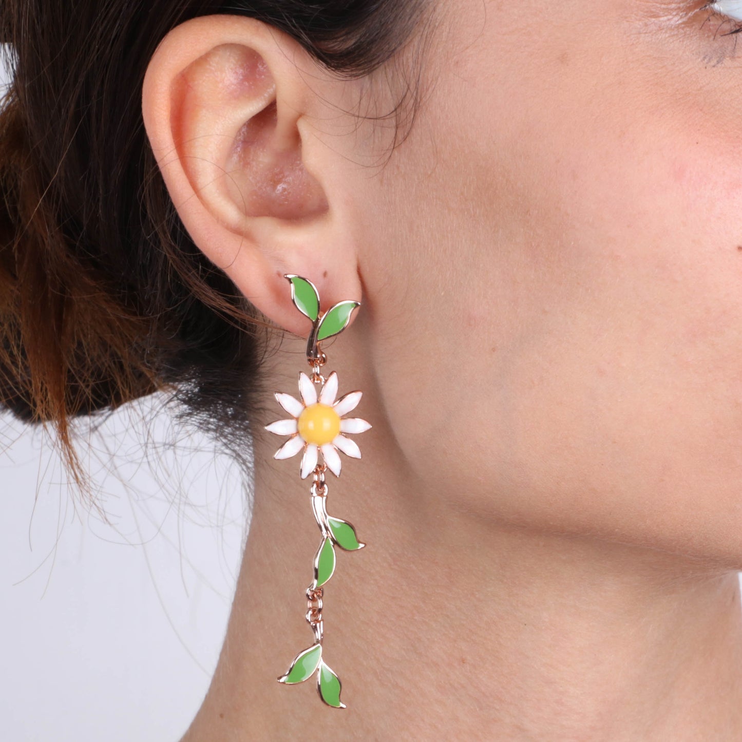 Metal earrings with margherita and pending leaves, embellished with colored glazes