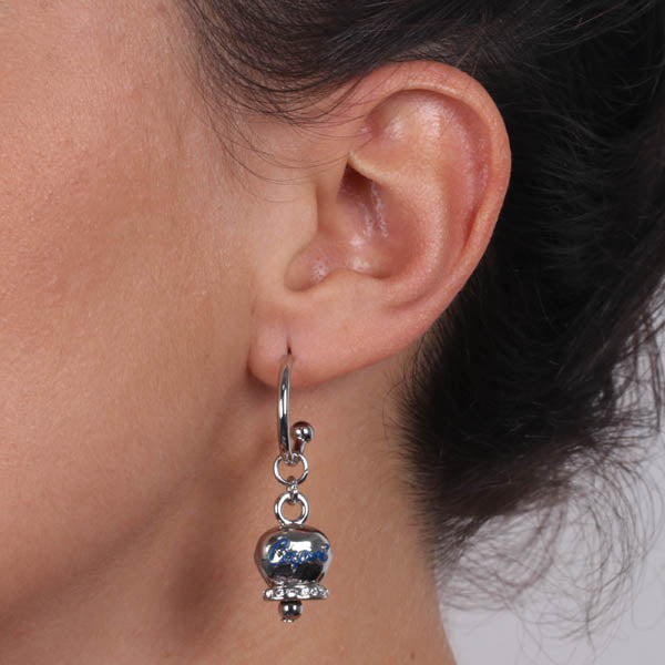 Metal earrings circles with a pendant bell embellished with crystals and writings in blue enamel capri