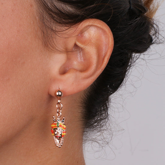 Pening metal earrings, with Sicilian dark brown heads embellished with colored glazes