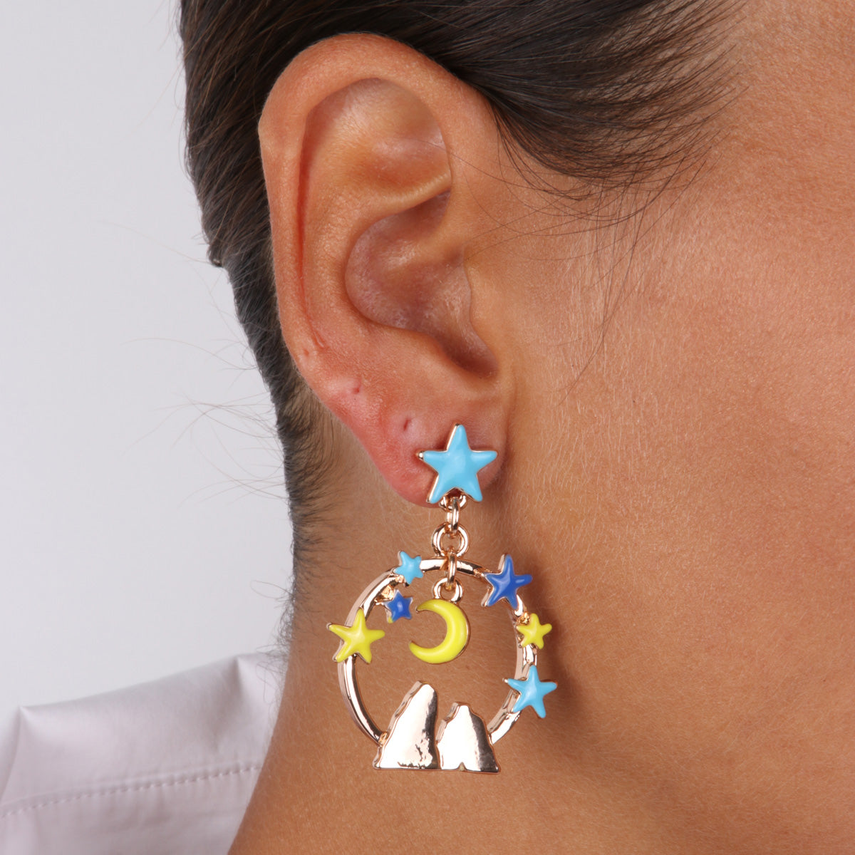 Metal earrings with star and rim pendants with starry sky and pharaglons embellished with colored glazes