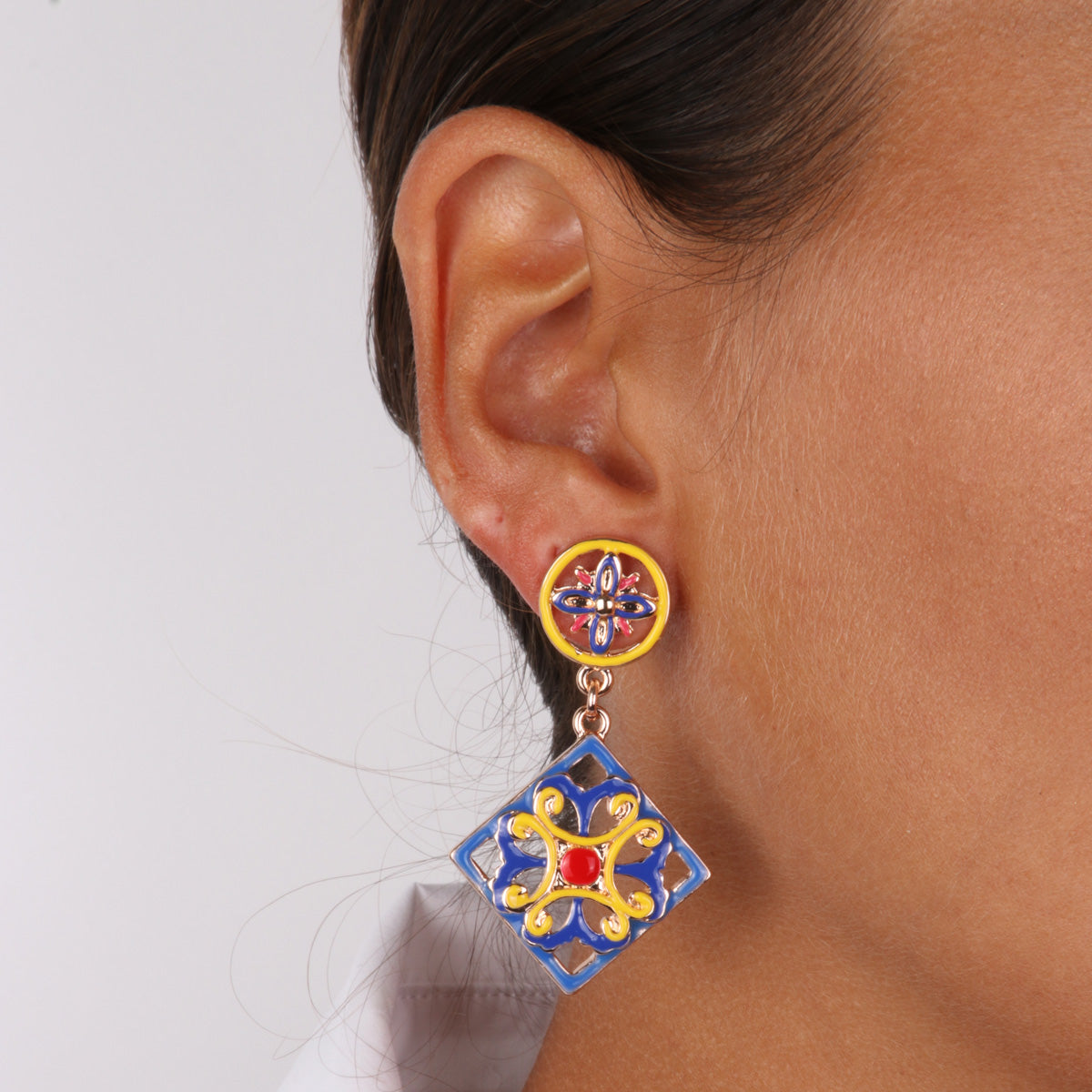 Metal earrings with yellow and red blue enamel -glazed majolica