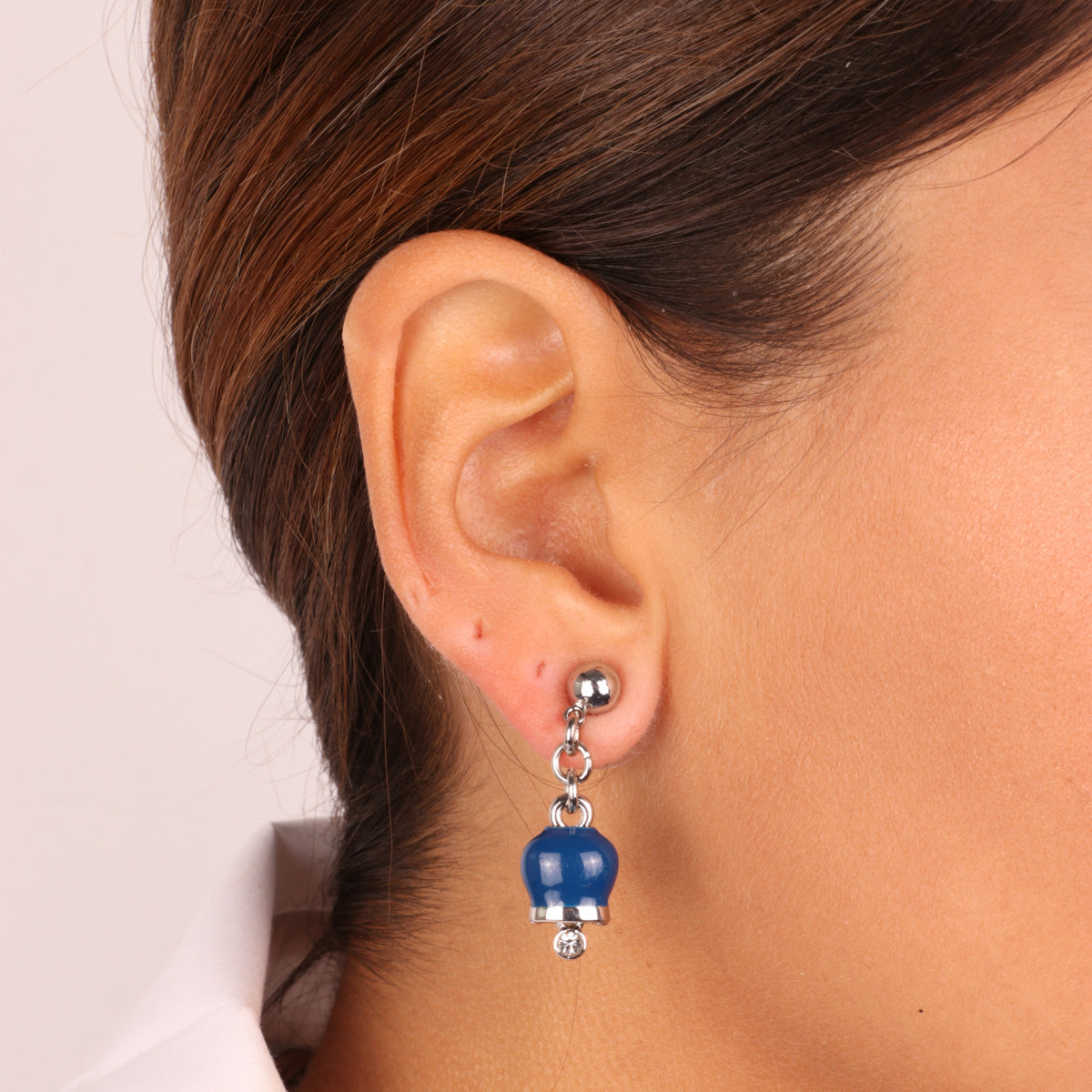 Metal earrings with billets charms of blue pendants, embellished with light point