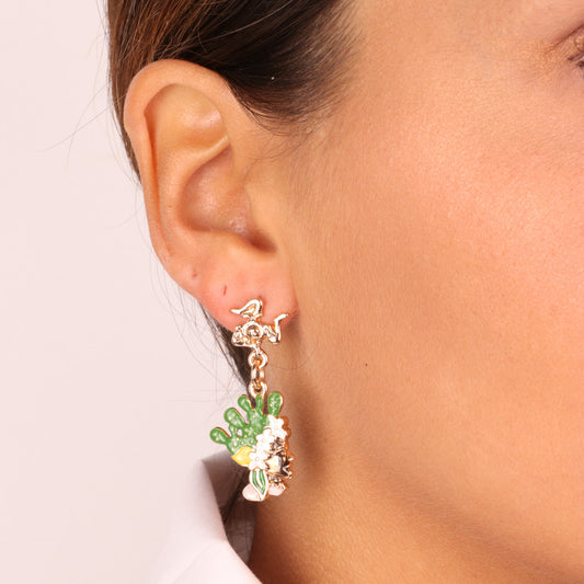 Metal earrings with clip closure with three legs from Trinacria and Moro heads embellished with colored glazes