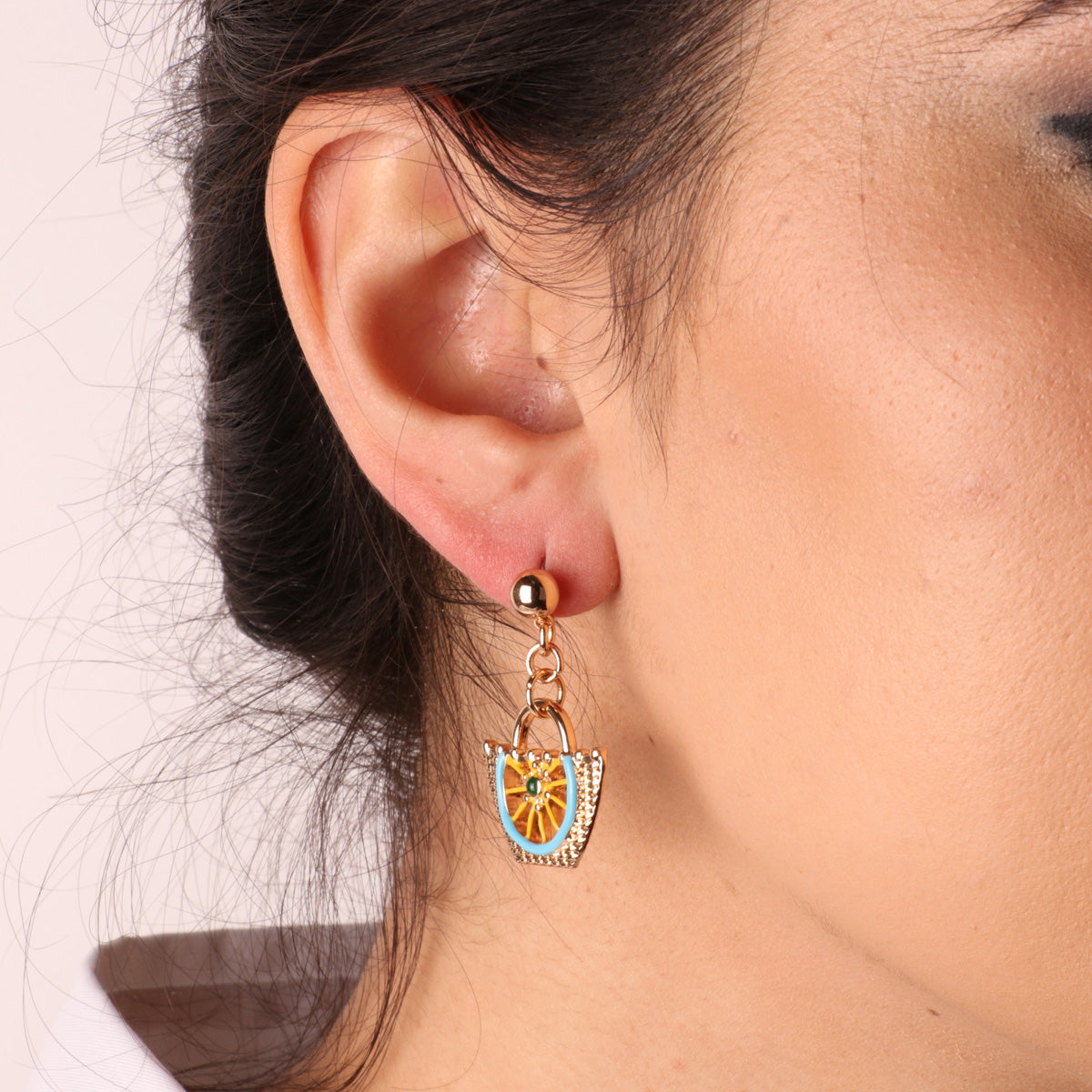 Coffa metal earrings with details in colored glazes