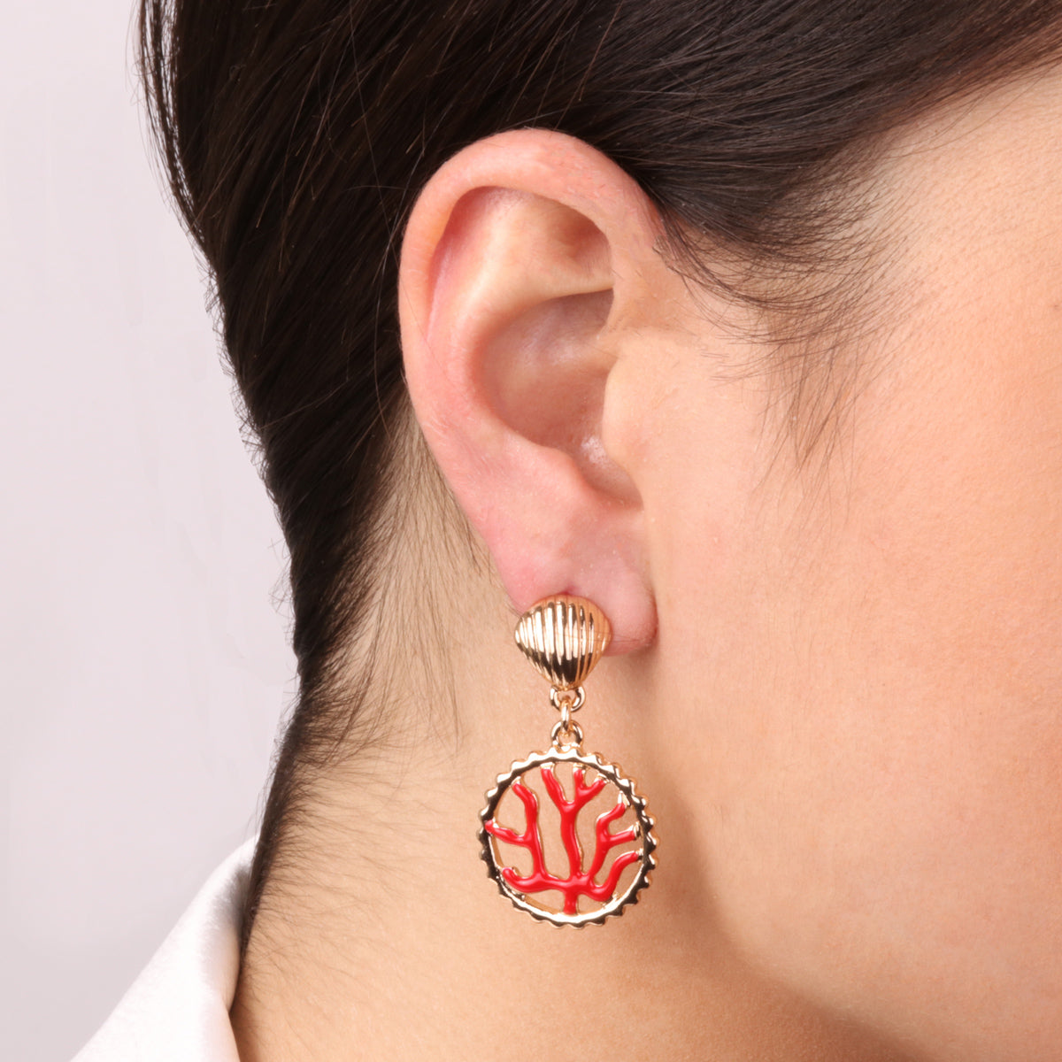 Metal earrings with red coral
