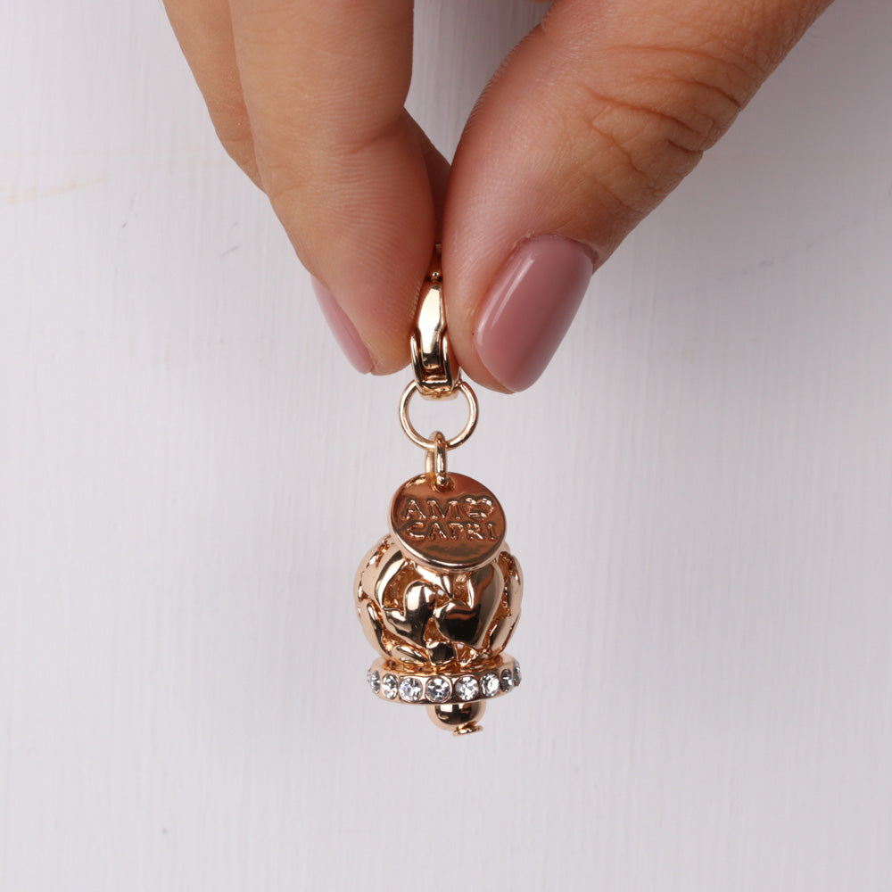 Metal pendant with a pitched pendant bell, with hearts, embellished with crystals