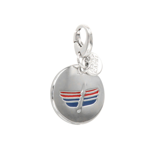 Metal pendant in medallion with a boat symbol, with colored glazes