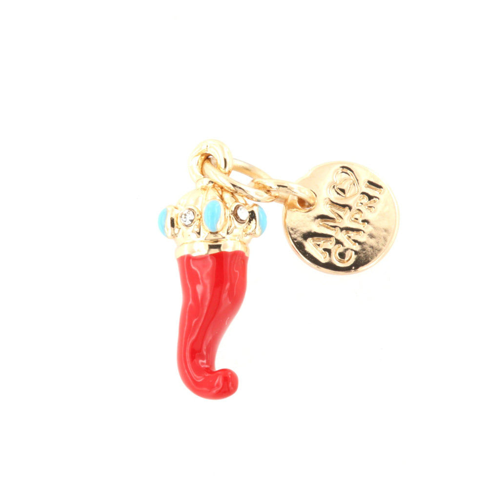 Metal pendant in the shape of a charming horn with crystals and colored glazes