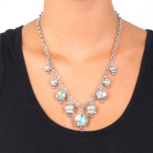 Metal necklace with colored pendants and white crystals