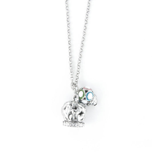 Metal necklace with bell from pierced bell with hearts with white crystals and small bell