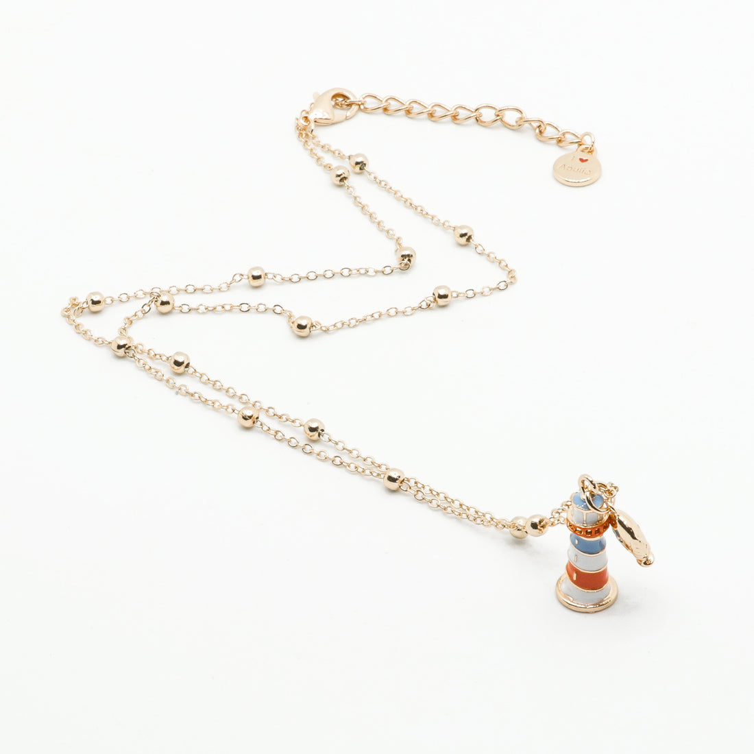 Metal necklace with pendant lighthouse embellished with colored glazes