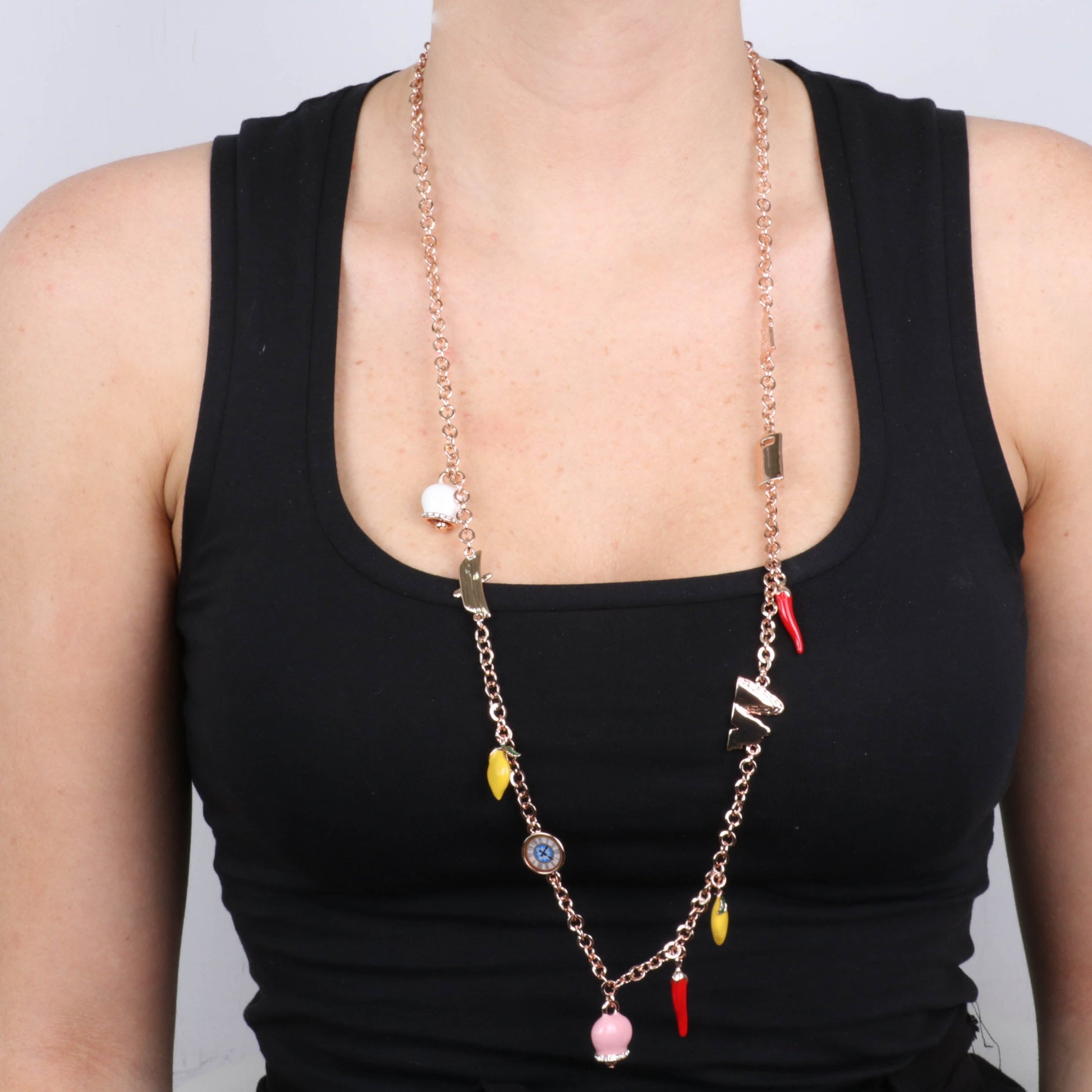 Metal necklace with charms inspired by the island of Capri, embellished with colored enamels and crystals